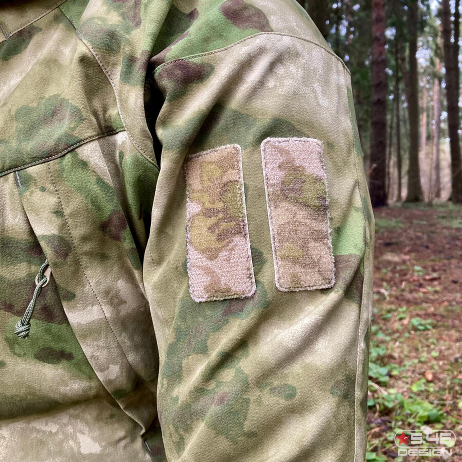 Velcro panels on the sleeves for placing identification patches.